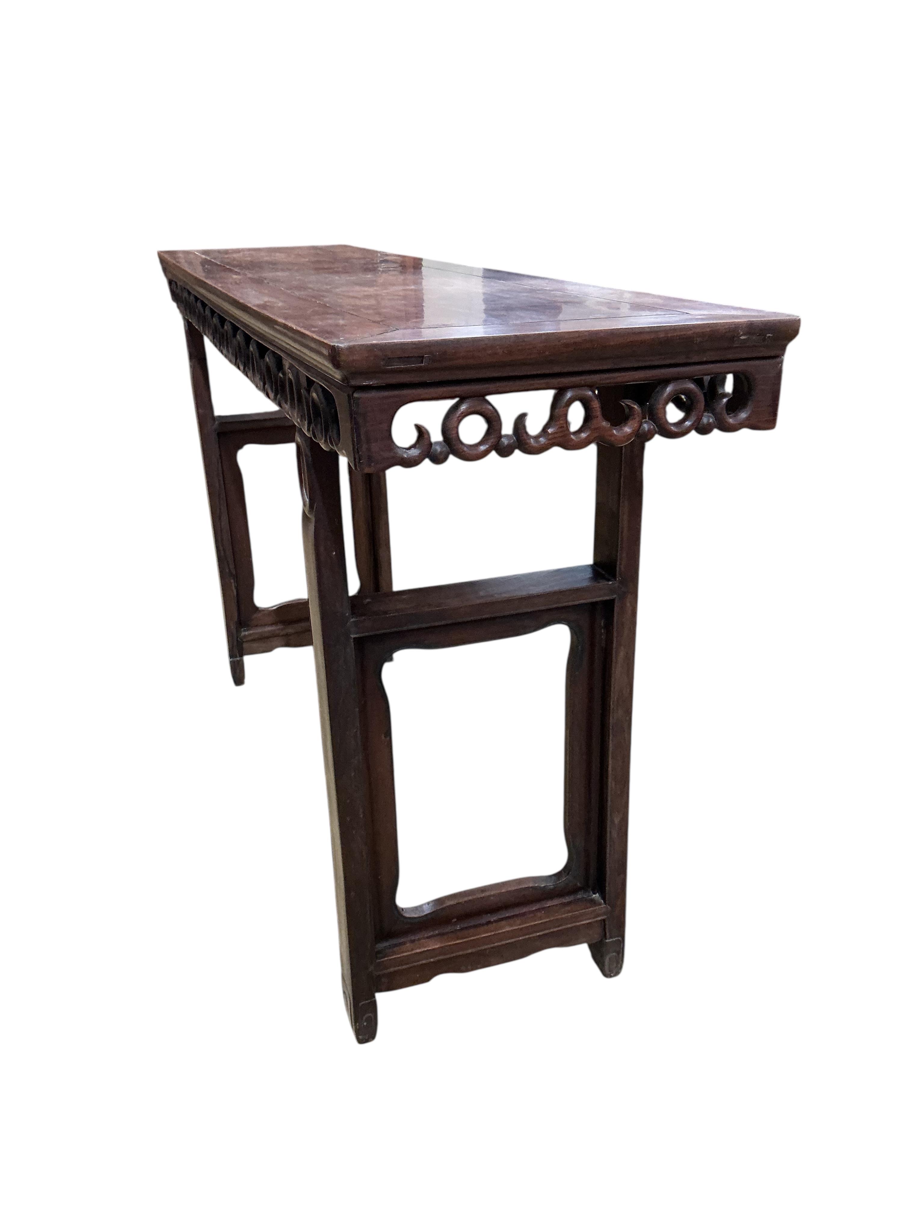 A Chinese altar table, width 181cm, depth 45cm, height 101cm